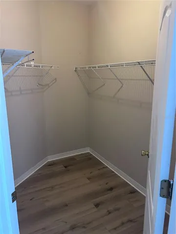 a view of a bathroom with sink bathtub and shower