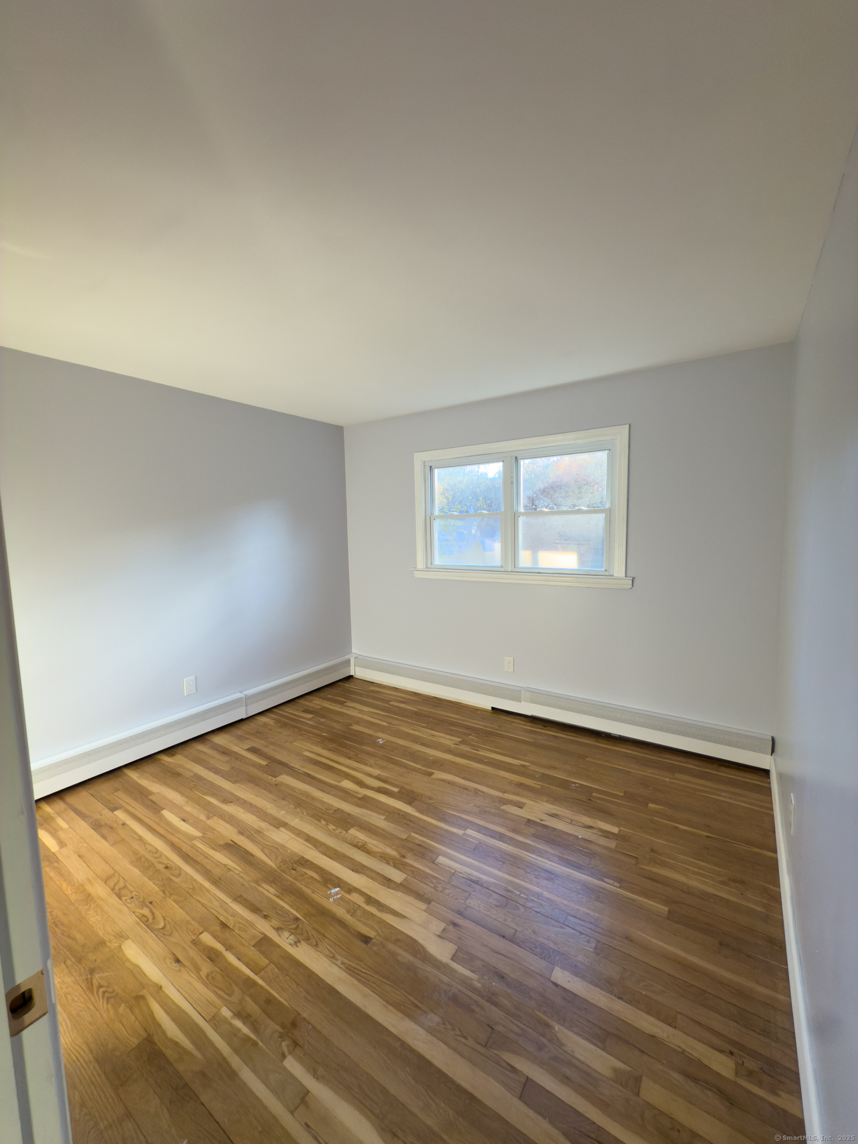3 Fairview Drive Stonington, CT 06379 - Photo 13 of 20 a view of an empty room and window