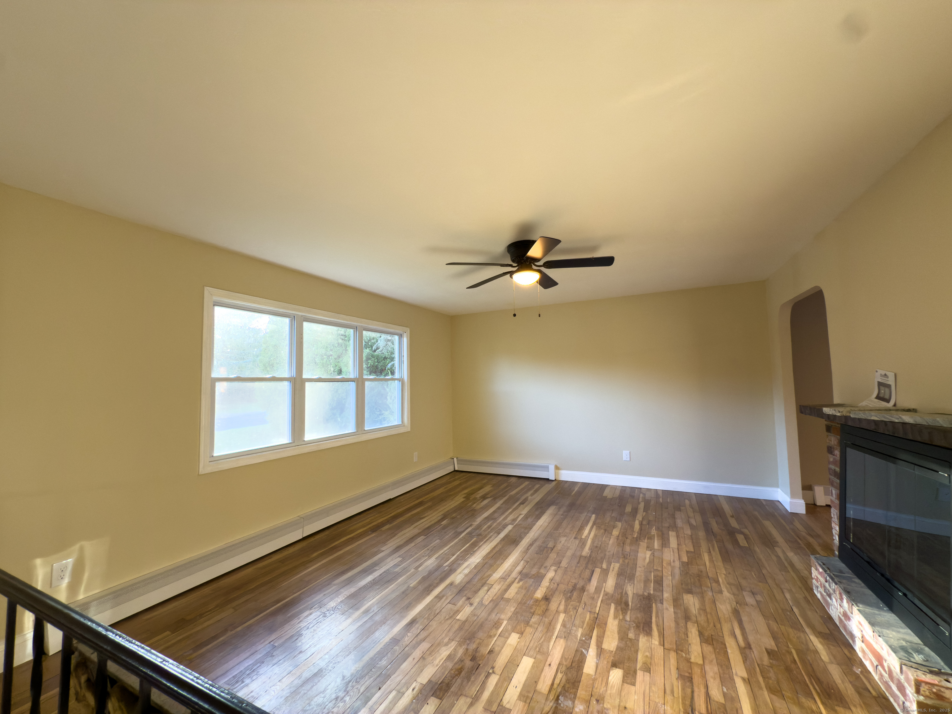 3 Fairview Drive Stonington, CT 06379 - Photo 15 of 20 a view of empty room with wooden floor and fan