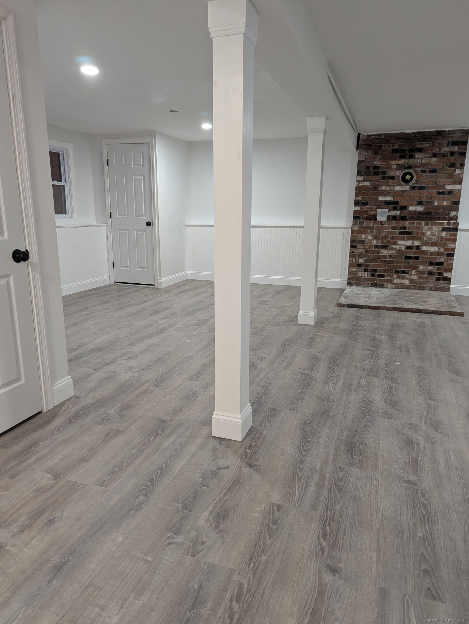 3 Fairview Drive Stonington, CT 06379 - Photo 16 of 20 a view of a room with wooden floor and window