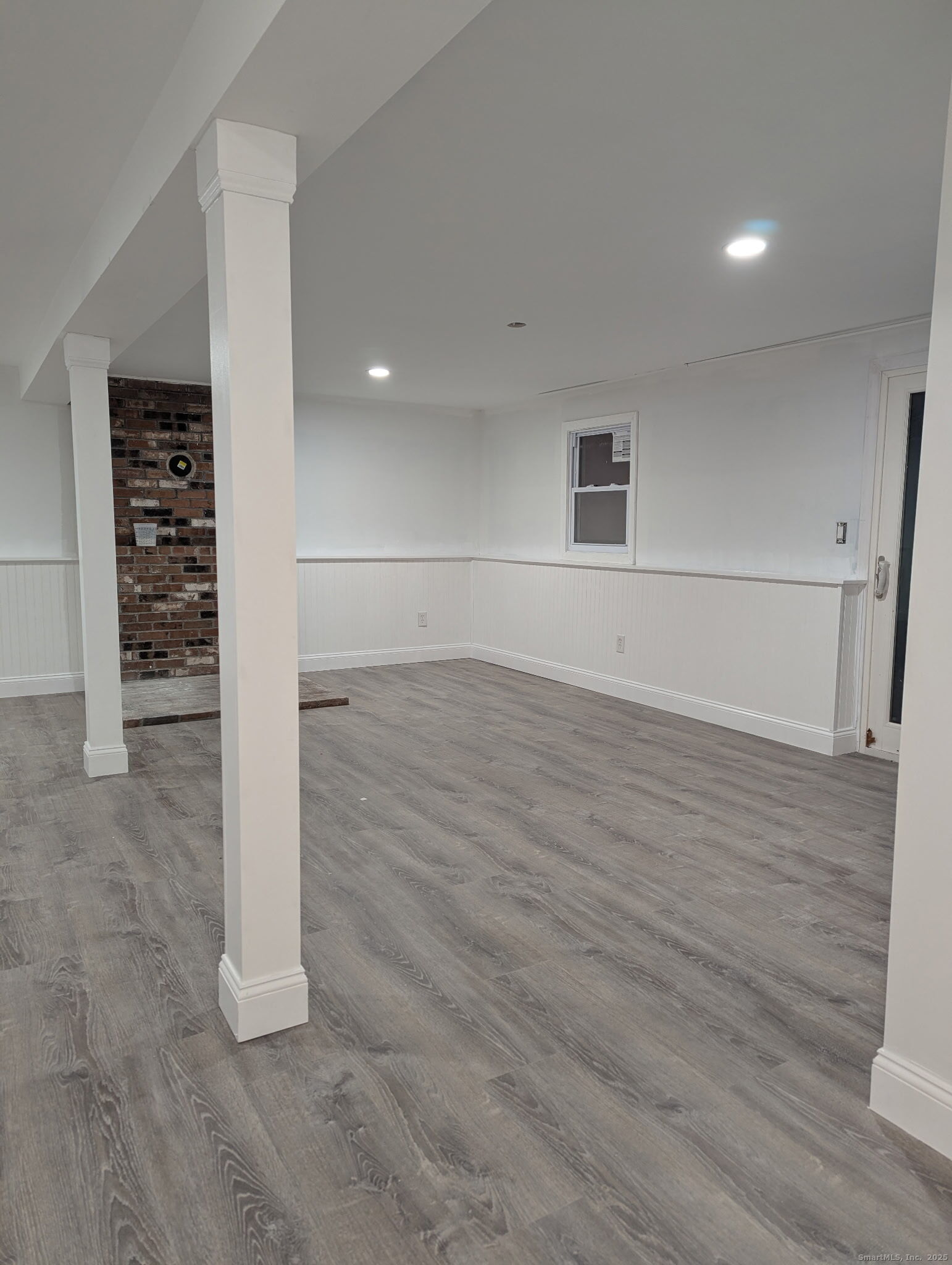3 Fairview Drive Stonington, CT 06379 - Photo 17 of 20 wooden floor in an empty room with a window