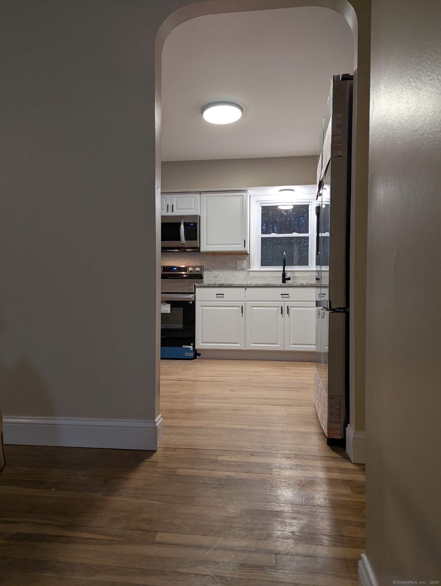 3 Fairview Drive Stonington, CT 06379 - Photo 3 of 20 a large kitchen with a stove top oven and sink
