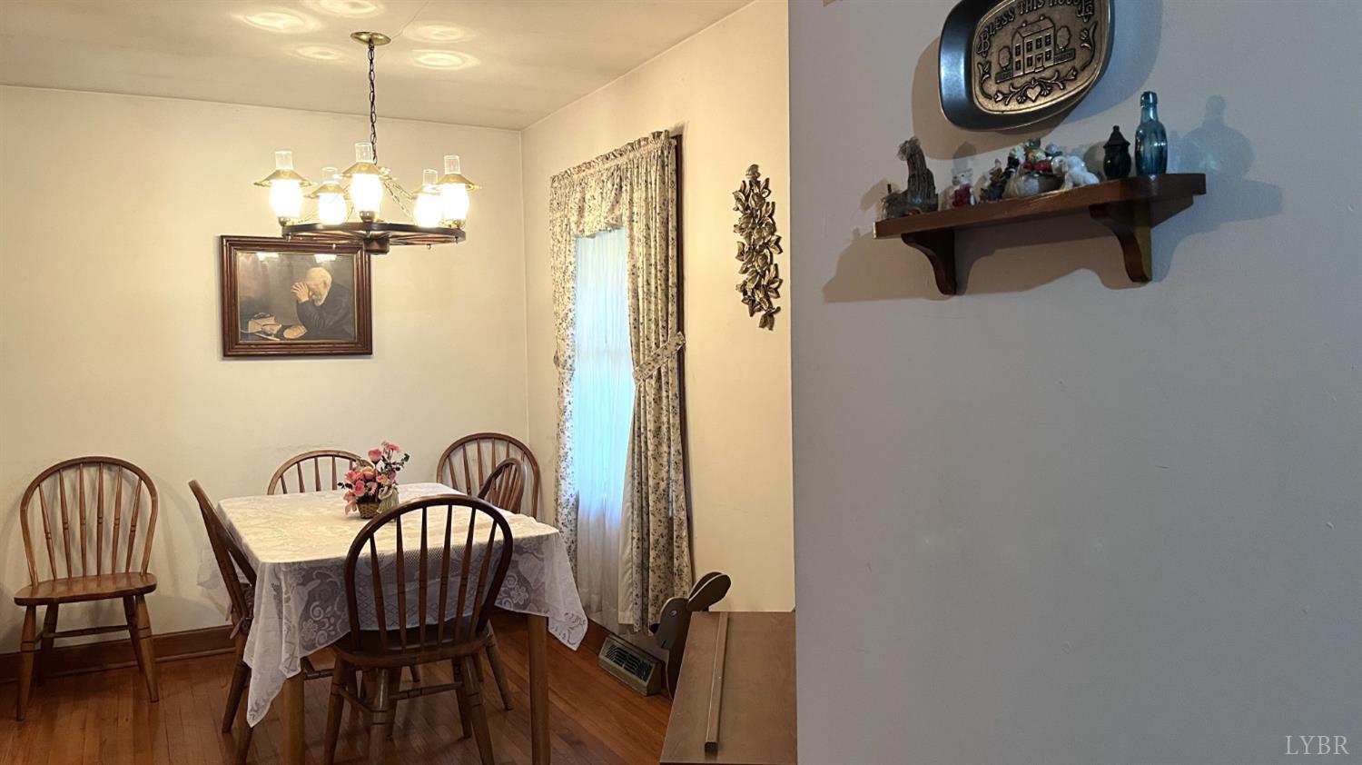 1091 Acorn Road Nathalie, VA 24577 - Photo 12 of 42 a dining room with furniture and a window