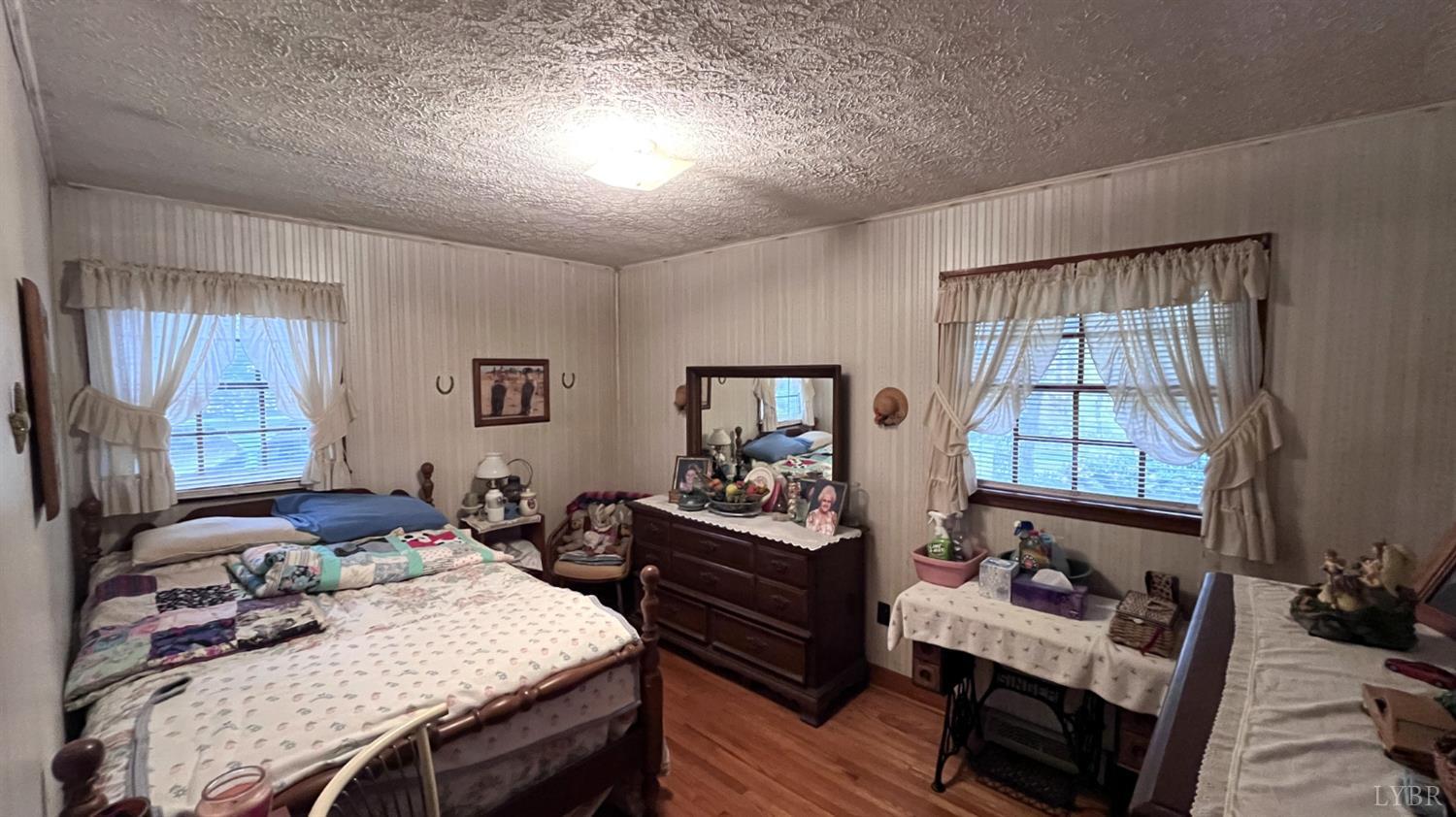 1091 Acorn Road Nathalie, VA 24577 - Photo 20 of 42 a bedroom with furniture and a window