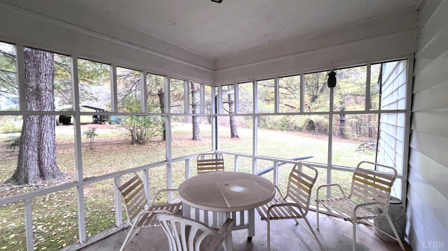 1091 Acorn Road Nathalie, VA 24577 - Photo 21 of 42 a view of a dining room with furniture water view and wooden floor