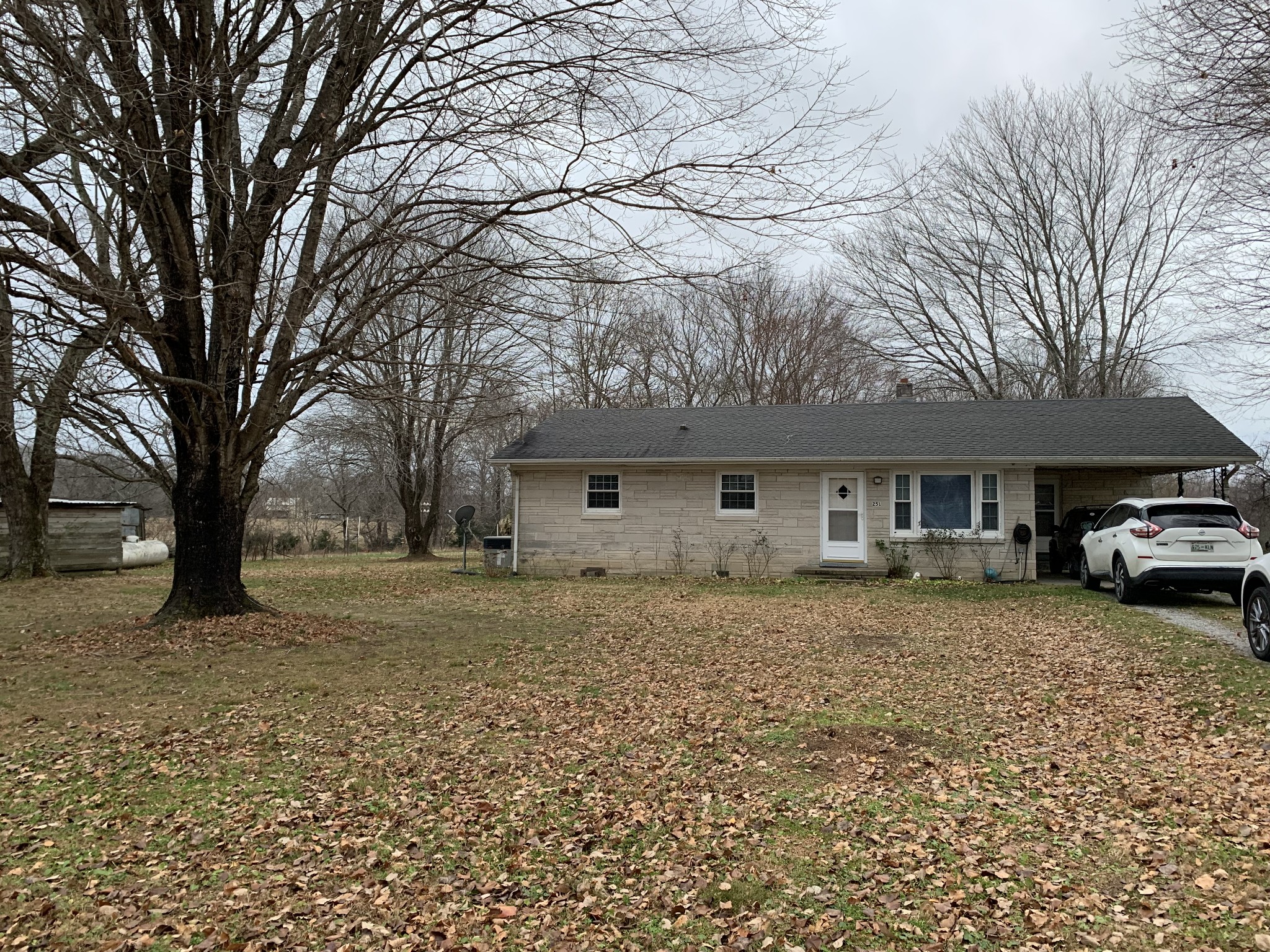 251 Rascal Town Road Loretto, TN 38469 - Photo 2 of 52 a front view of a house with a yard