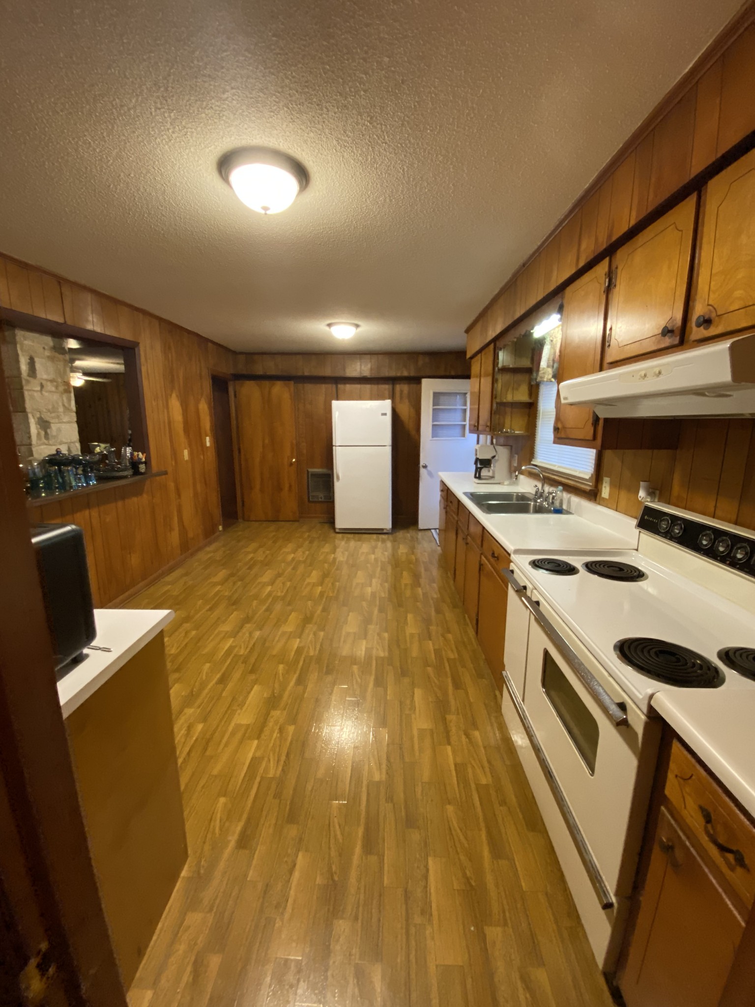 251 Rascal Town Road Loretto, TN 38469 - Photo 11 of 52 a kitchen with a sink appliances and cabinets
