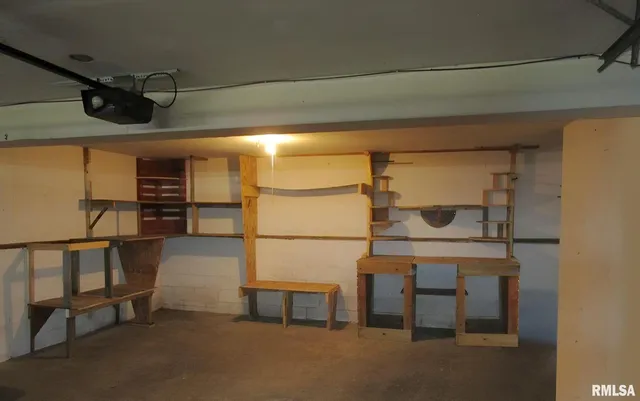 a bathroom with a shower and a sink