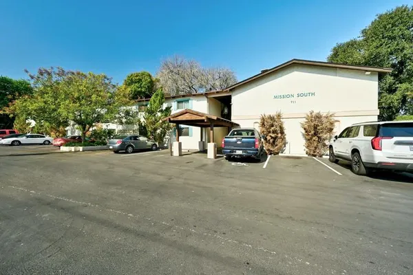 a view of car parked in front of house