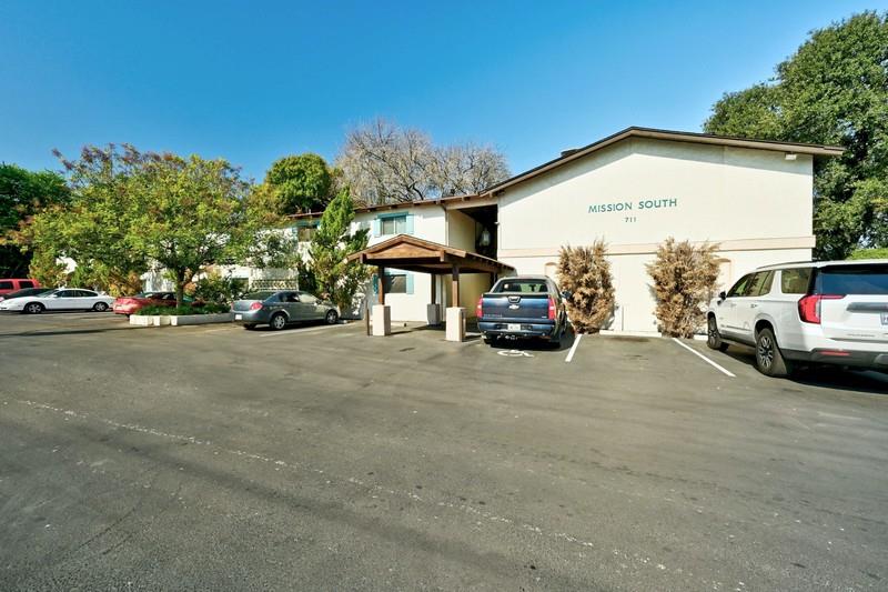 711 Eberhart Lane, Unit 202 Austin, TX 78745 - Photo 7 of 7 a view of car parked in front of house