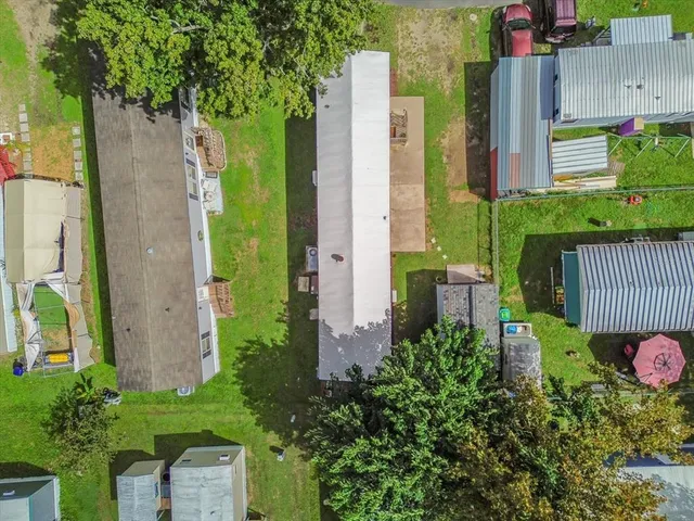 front view of a house with a garden