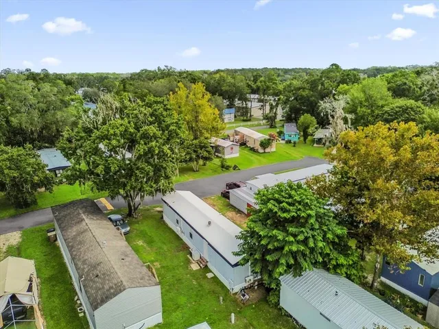 a view of a yard with an outdoor space
