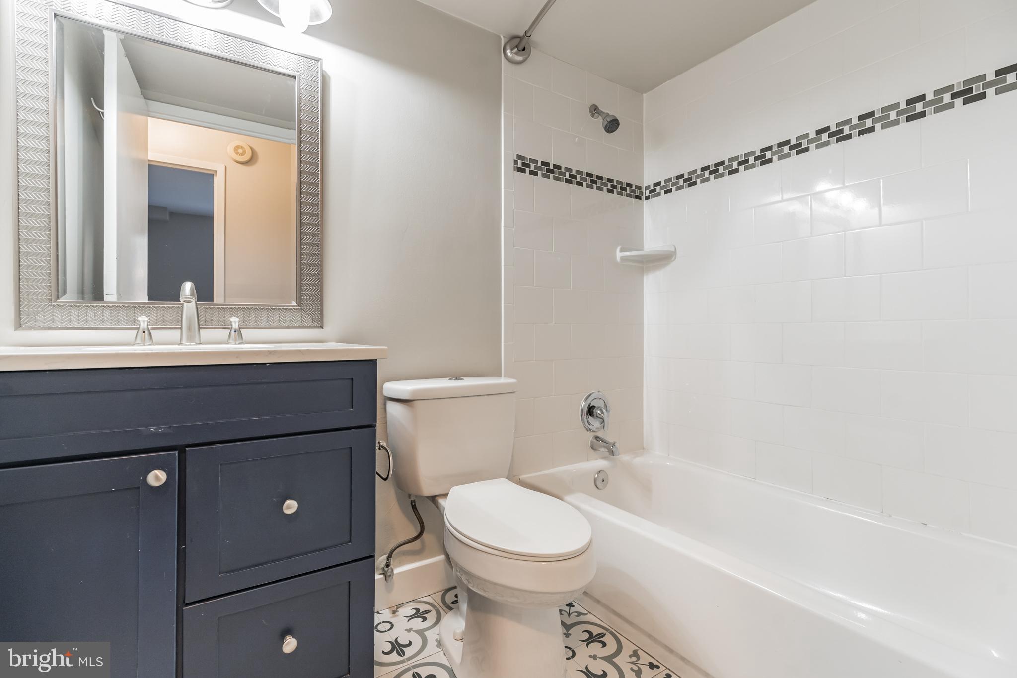 11216 Chestnut Grove Square, Unit 11216220 Reston, VA 20190 - Photo 12 of 18 Updated Hall Full Bath