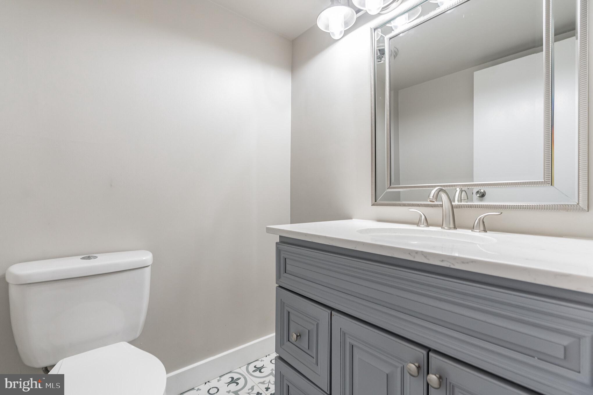 11216 Chestnut Grove Square, Unit 11216220 Reston, VA 20190 - Photo 15 of 18 Primary Bedroom Half Bath
