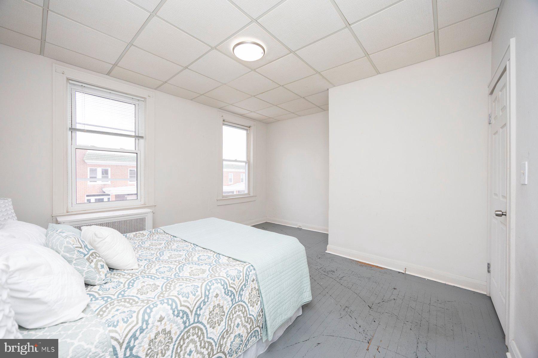3237 Dudley Avenue Baltimore, MD 21213 - Photo 9 of 16 King sized Bedroom 1 w/ additional space