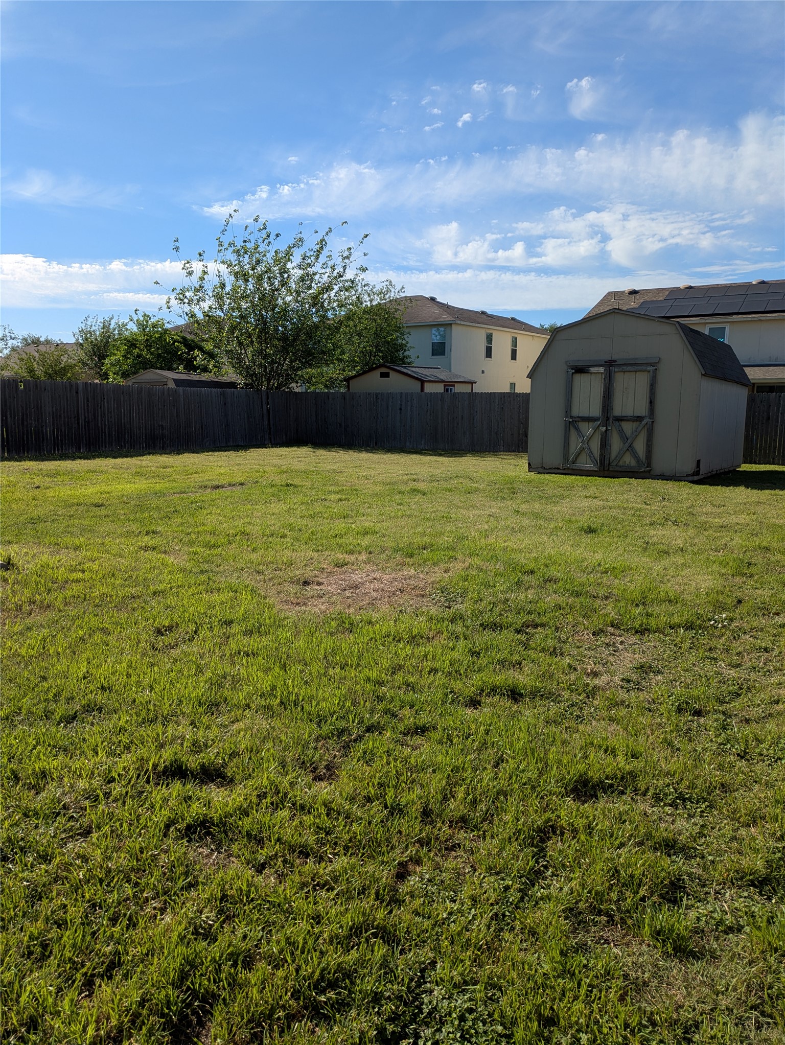 209 Phillips Street Hutto, TX 78634 - Photo 11 of 11 a front view of a house with a yard