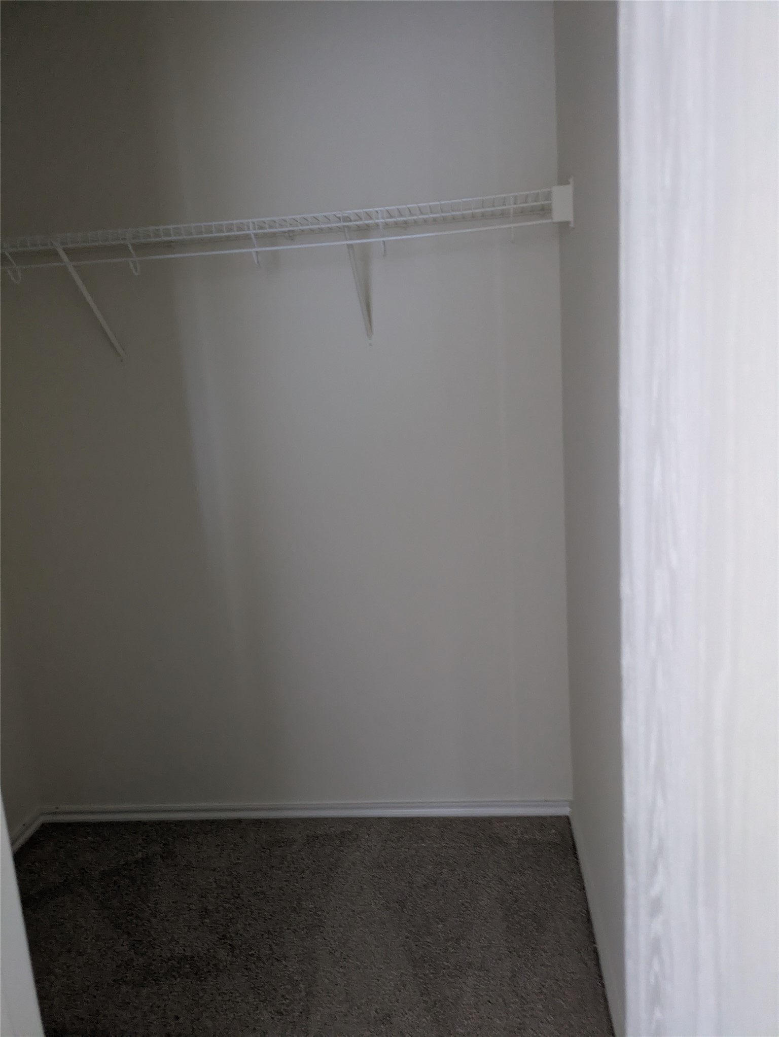 209 Phillips Street Hutto, TX 78634 - Photo 10 of 11 a view of small space with racks on the wall