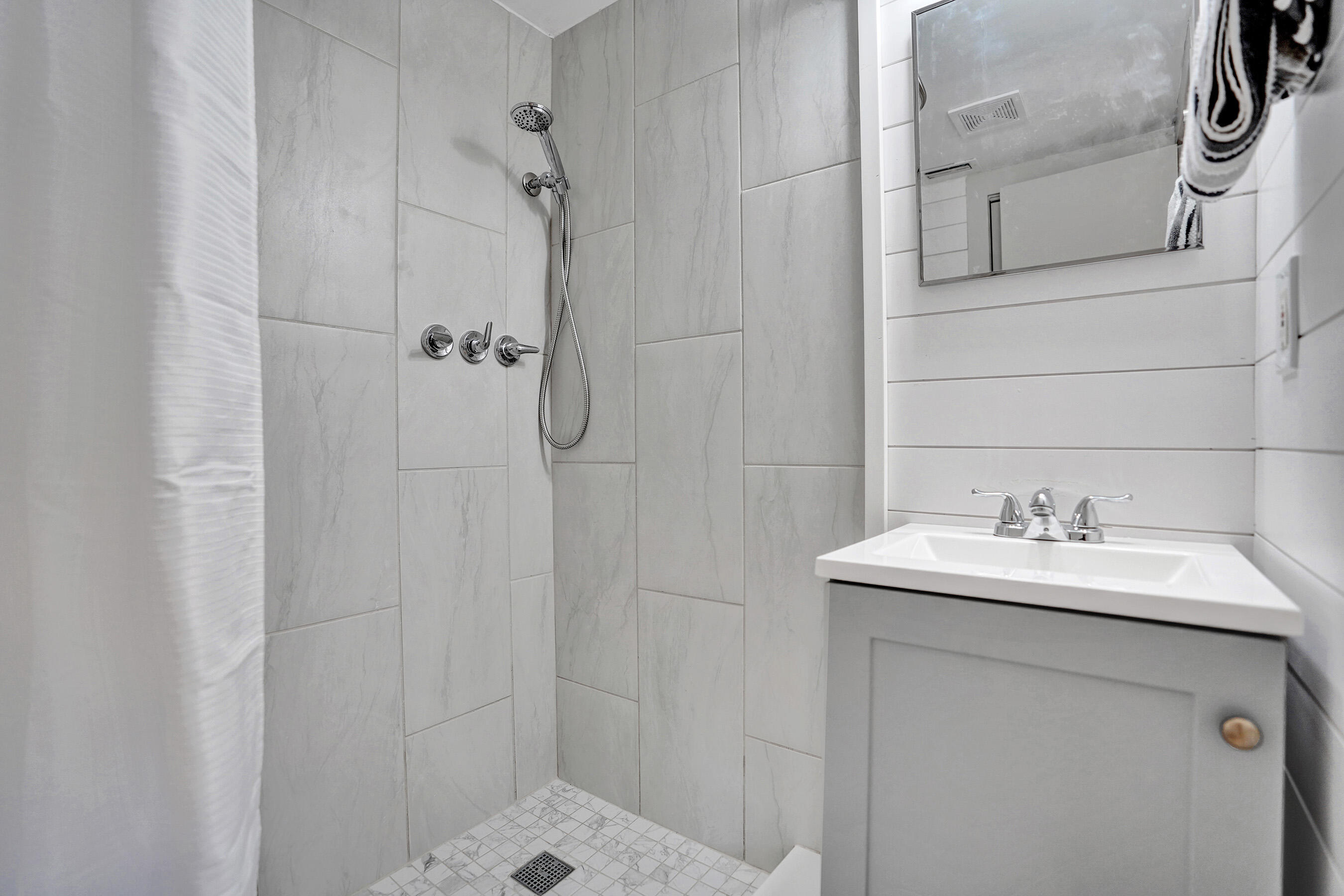 2820 Southwest 13th Street, Unit 101 Delray Beach, FL 33445 - Photo 48 of 83 Guest bathroom
