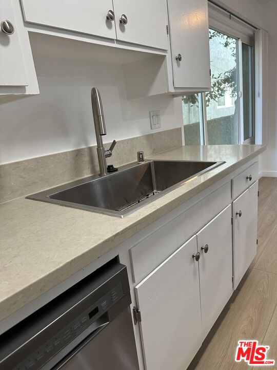12610 Caswell Avenue, Unit 4 Los Angeles, CA 90066 - Photo 6 of 16 a close view of sink and tap