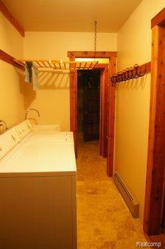 41555 Riggs Road Belleville, MI 48111 - Photo 19 of 20 Laundry Room Leading to Bath
