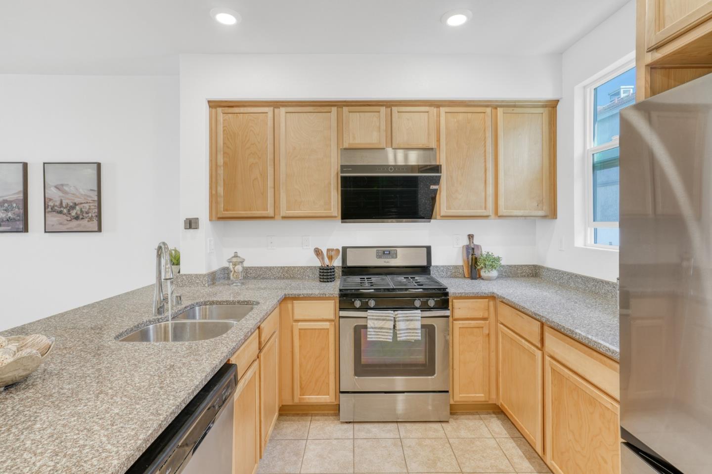 1425 Lavender Loop Milpitas, CA 95035 - Photo 12 of 59 a kitchen with a sink stove top oven and refrigerator
