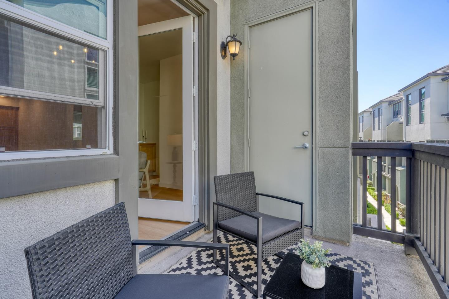 1425 Lavender Loop Milpitas, CA 95035 - Photo 15 of 59 a balcony with table and chairs