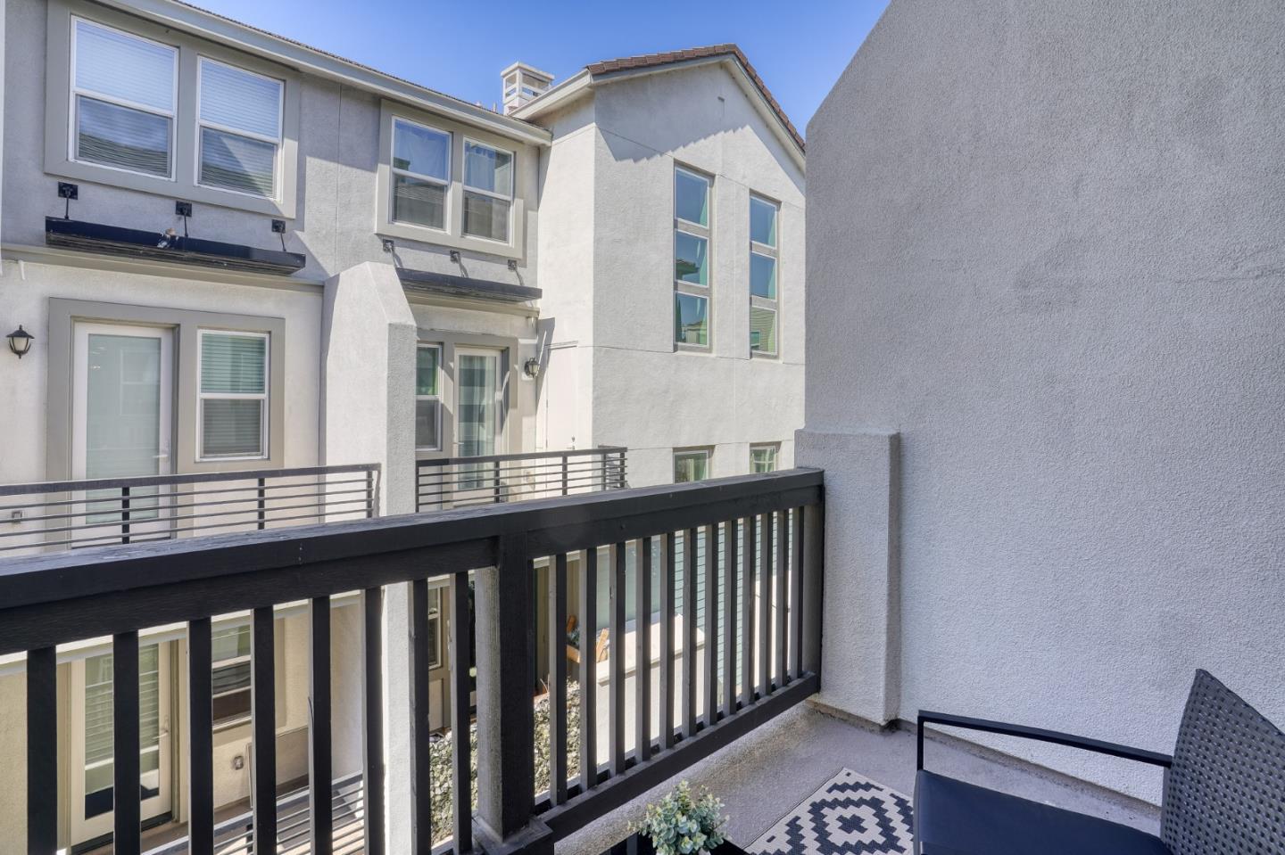 1425 Lavender Loop Milpitas, CA 95035 - Photo 17 of 59 a view of a brick building from a balcony
