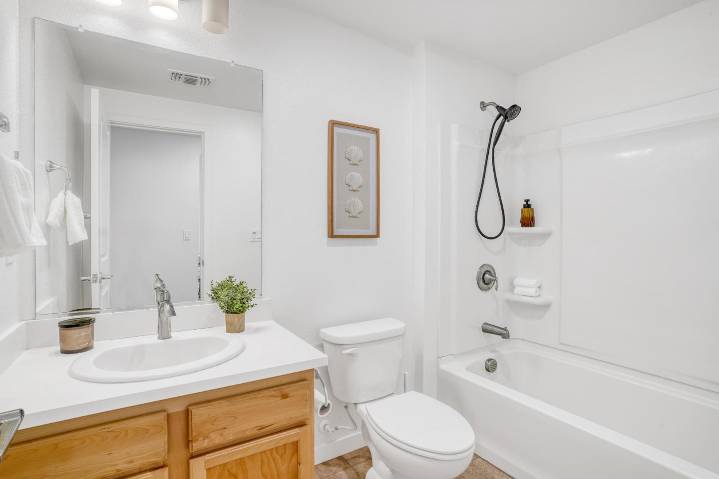 1425 Lavender Loop Milpitas, CA 95035 - Photo 22 of 59 a bathroom with a sink a toilet and a bathtub