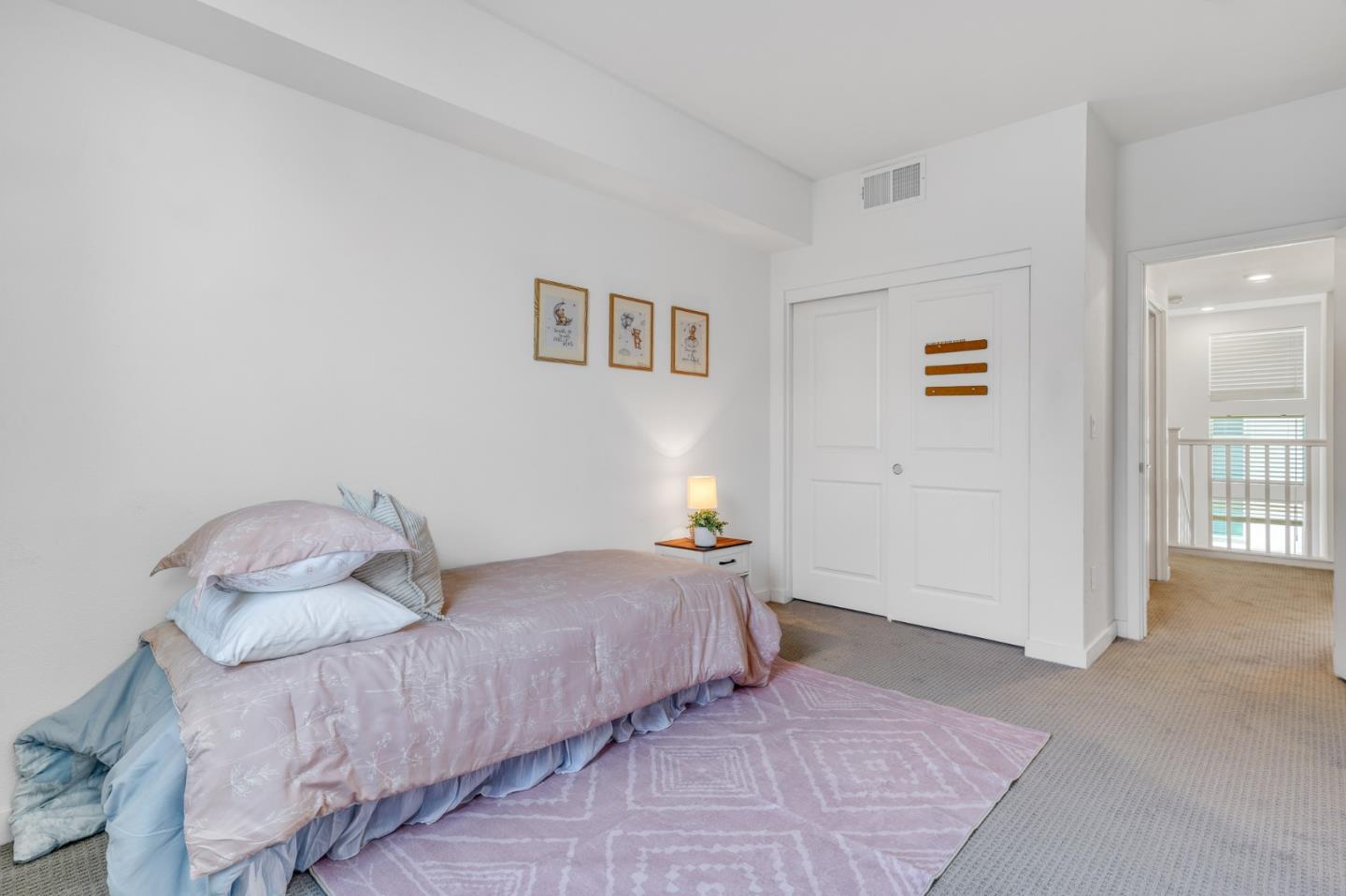 1425 Lavender Loop Milpitas, CA 95035 - Photo 25 of 59 a bedroom with a bed and a painting on the wall