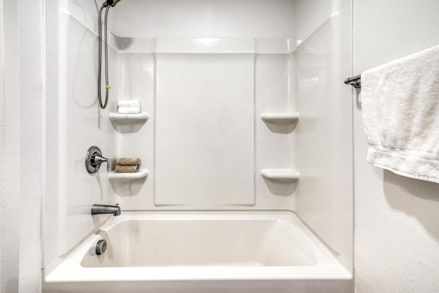 1425 Lavender Loop Milpitas, CA 95035 - Photo 33 of 59 a bathroom with a bathtub and a shower