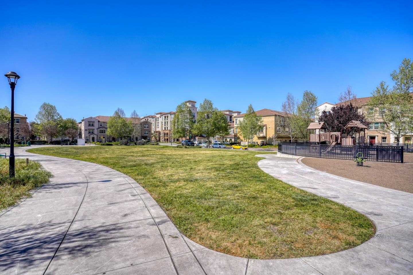 1425 Lavender Loop Milpitas, CA 95035 - Photo 40 of 59 a view of a swimming pool with an outdoor space and seating area