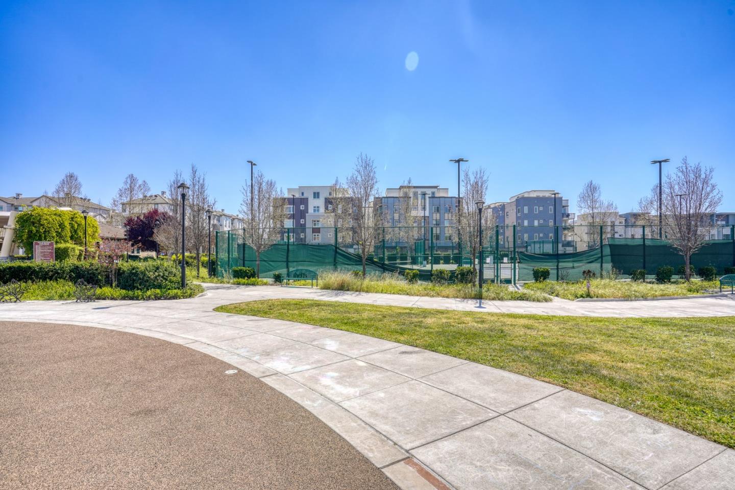 1425 Lavender Loop Milpitas, CA 95035 - Photo 42 of 59 a view of a swimming pool and a yard