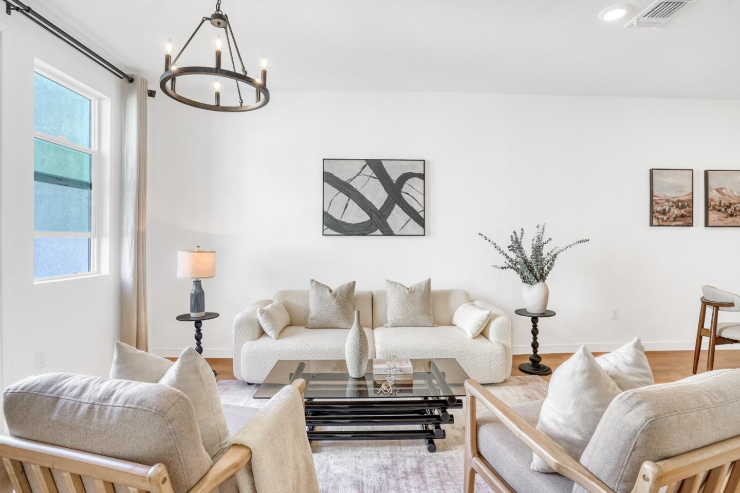 1425 Lavender Loop Milpitas, CA 95035 - Photo 5 of 59 a living room with furniture and a chandelier