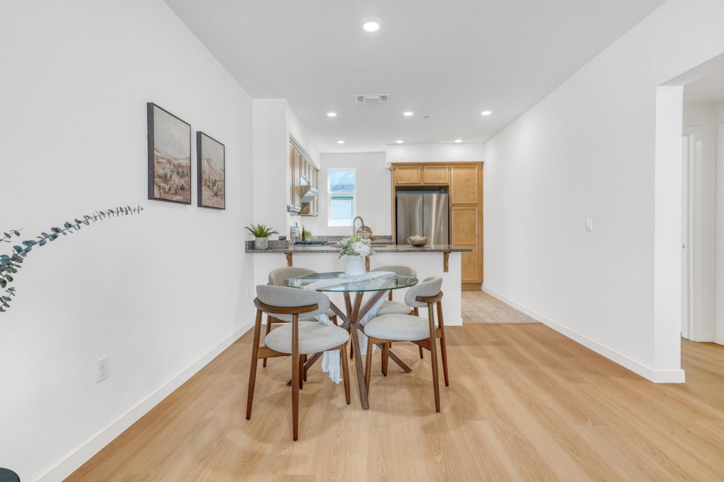1425 Lavender Loop Milpitas, CA 95035 - Photo 7 of 59 a dining room with furniture and wooden floor