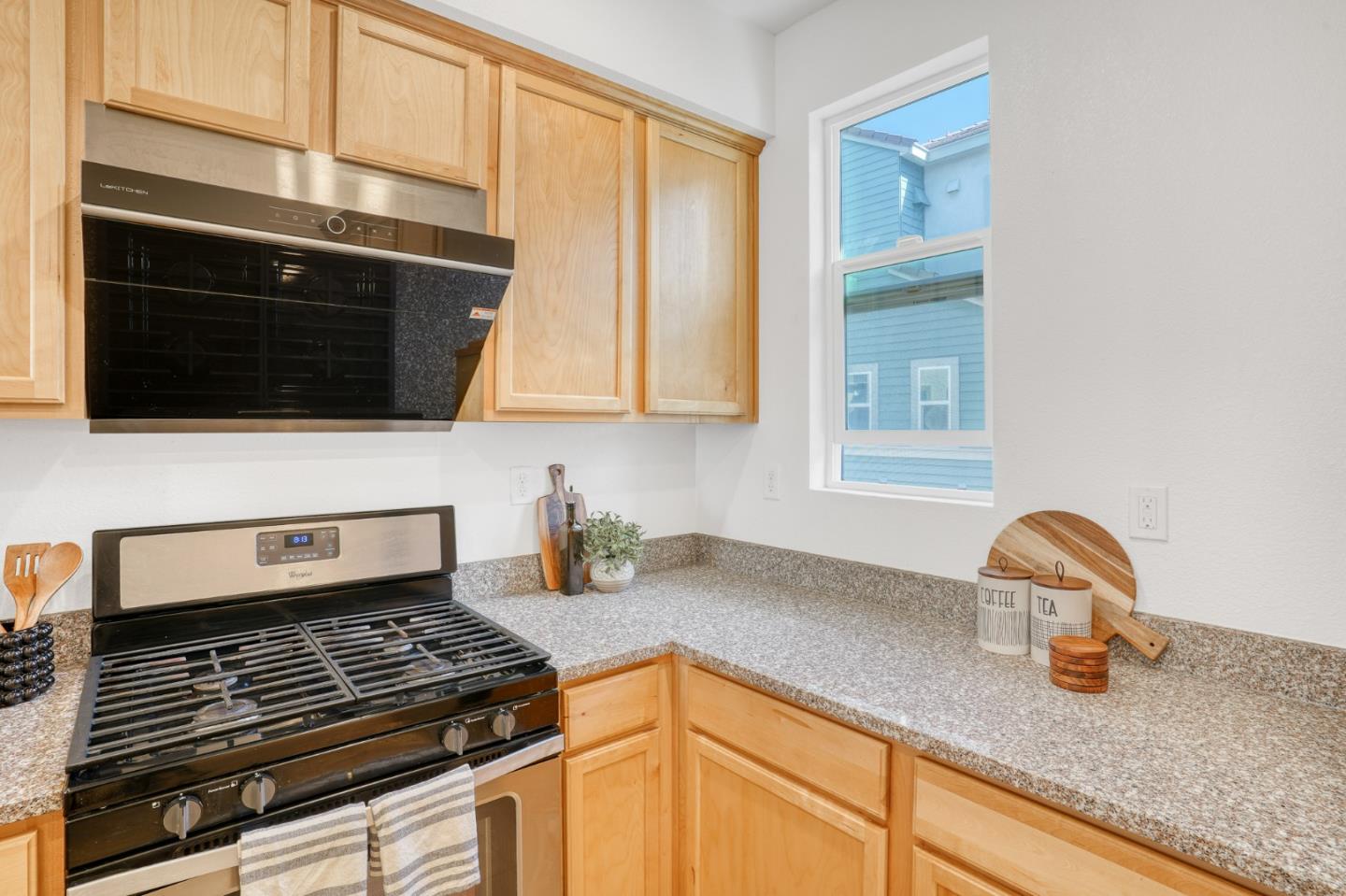 1425 Lavender Loop Milpitas, CA 95035 - Photo 8 of 59 a kitchen with granite countertop a stove and a sink