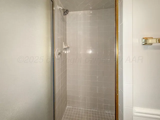 a view of a livingroom with a kitchen