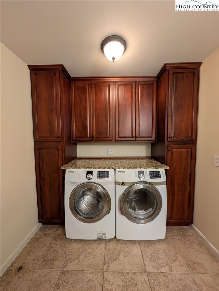 57 Village Road Glade Valley, NC 28627 - Photo 14 of 47 a utility room with dryer and washer