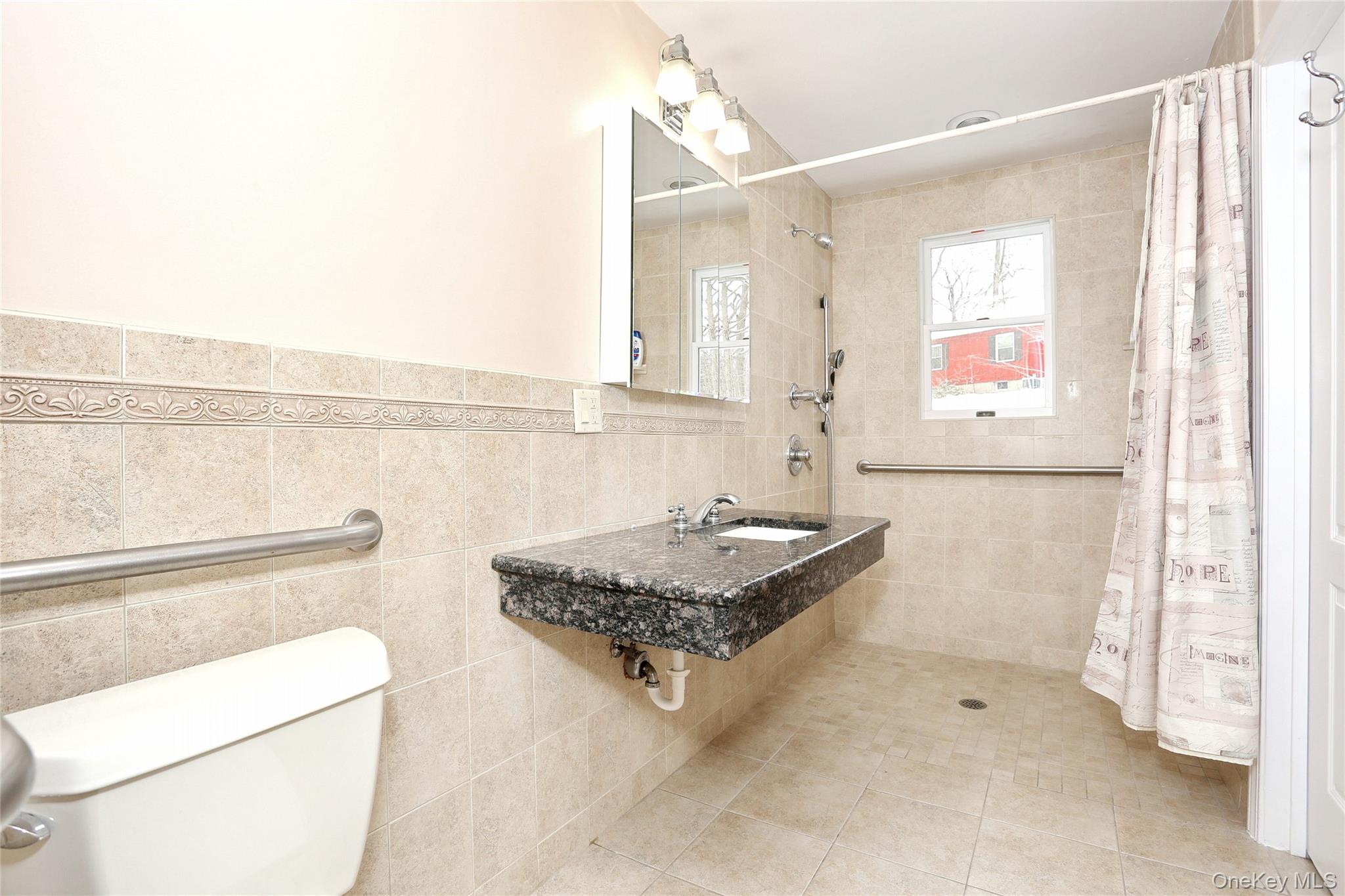 277 Saddle River Road Airmont, NY 10952 - Photo 11 of 25 a living room with a couch and a table