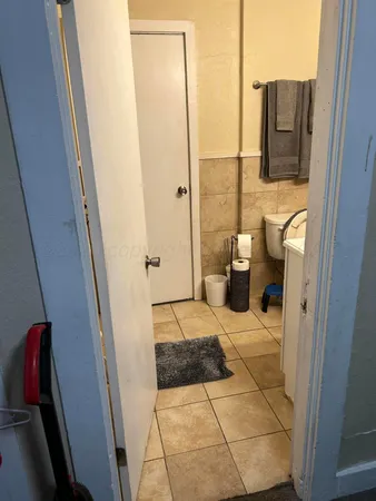 a bathroom with a sink and toilet