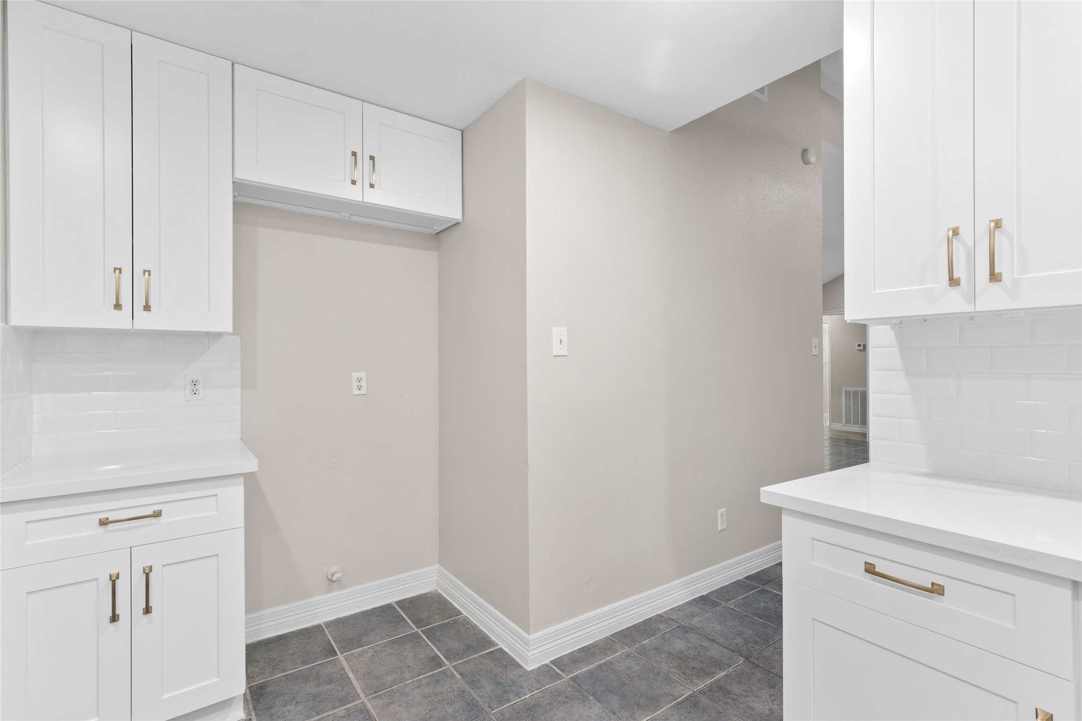8314 Poplar Ridge Lane Humble, TX 77338 - Photo 11 of 20 a view of a kitchen with white cabinets