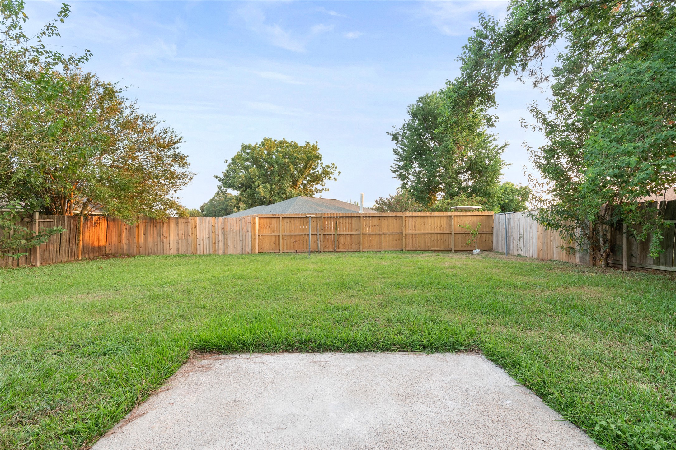 8314 Poplar Ridge Lane Humble, TX 77338 - Photo 20 of 20 a view of a backyard with green space