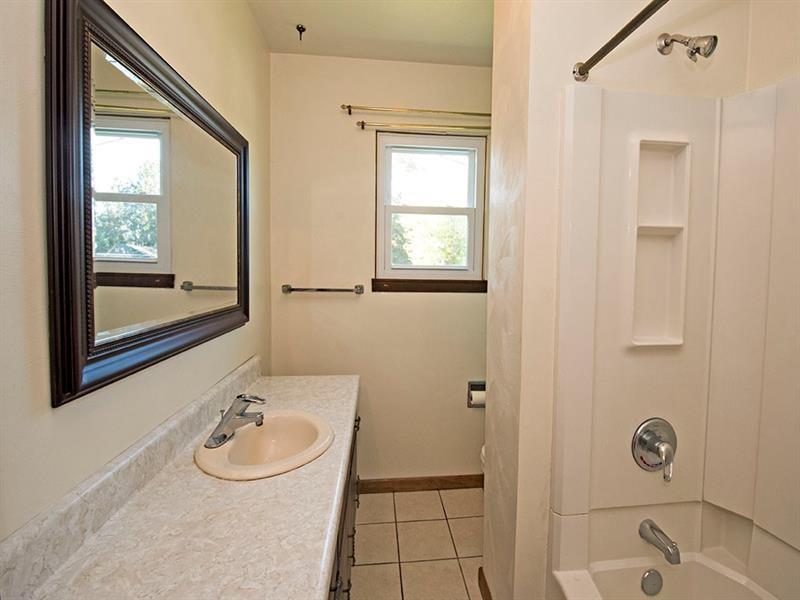 426 Ridge Avenue Springdale, PA 15144 - Photo 14 of 19 Full Bath with extended vanity, Tub/Shower Combo and ceramic tile floor.