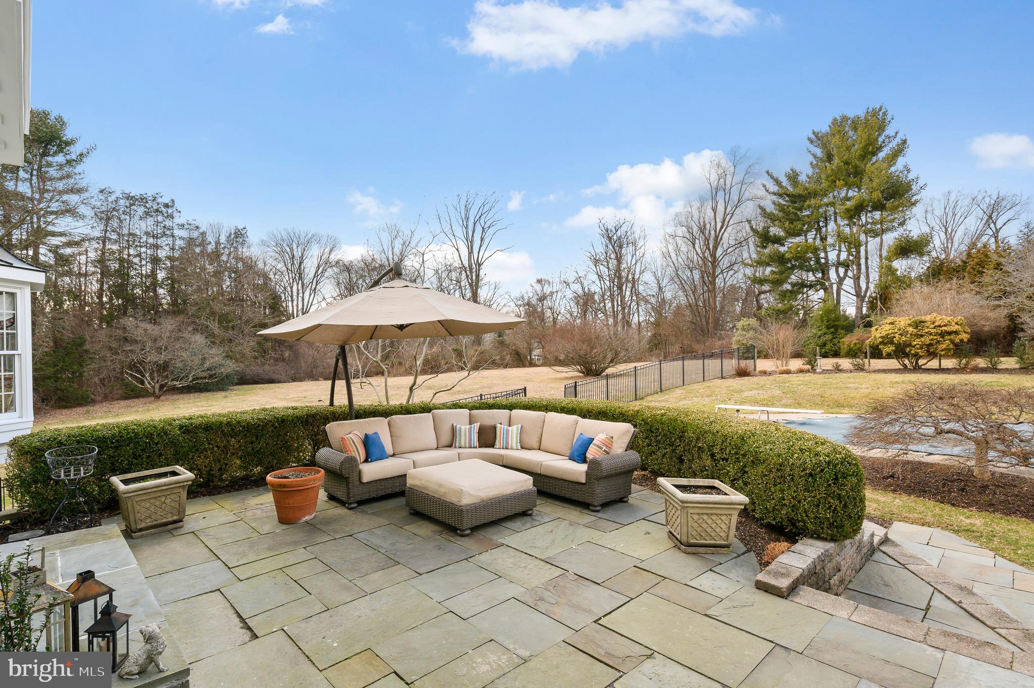 9 Plymouth Road Newtown Square, PA 19073 - Photo 26 of 28 Flagstone Patio overlooking Pool