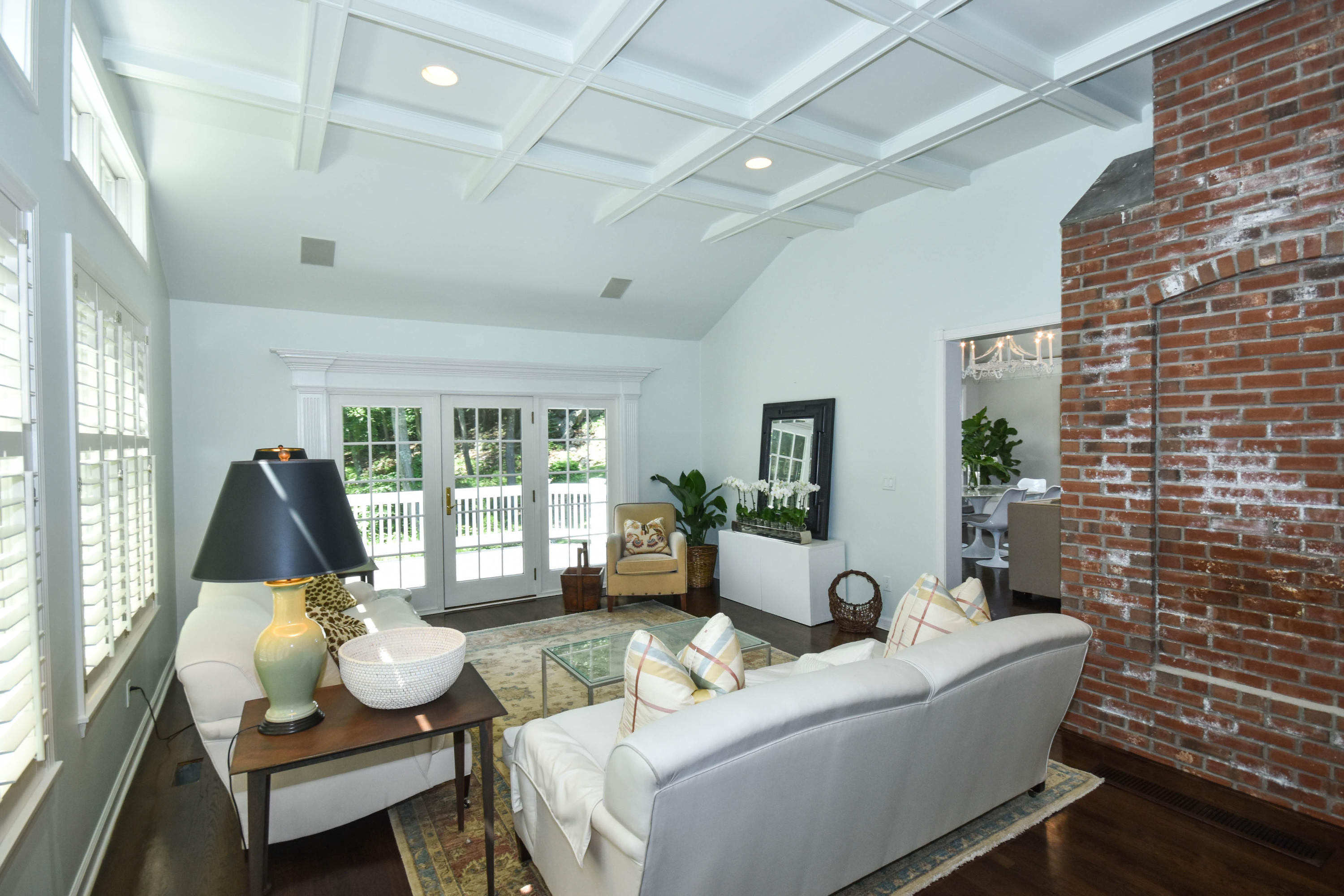 104 Jonathan Road New Canaan, CT 06840 - Photo 11 of 25 a living room with furniture and floor to ceiling windows