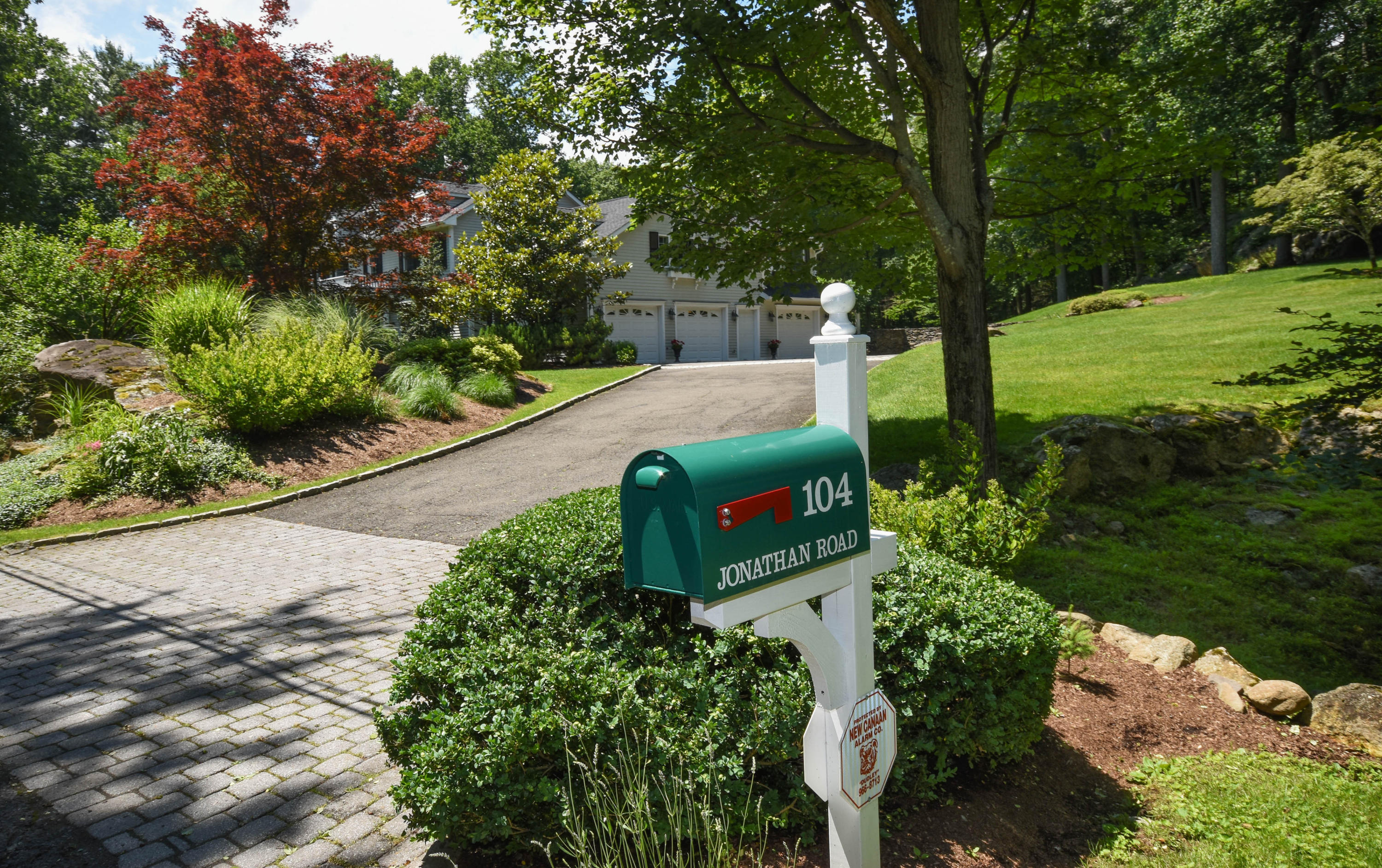 104 Jonathan Road New Canaan, CT 06840 - Photo 22 of 25 a view of a garden with plants