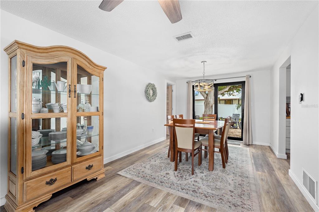1481 Piedmont Road Venice, FL 34293 - Photo 7 of 52 Dinning Room with own connection to outdoor patio