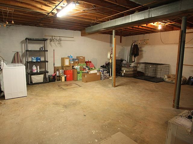 1120 Manchester Drive Raleigh, NC 27609 - Photo 10 of 13 You can never have enough storage!! This house has got it! Basement Storage just off the Basement Bonus Area. Built in Shelves & all utilities. Storage