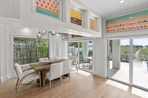 a bathroom with a tub a sink and a shower