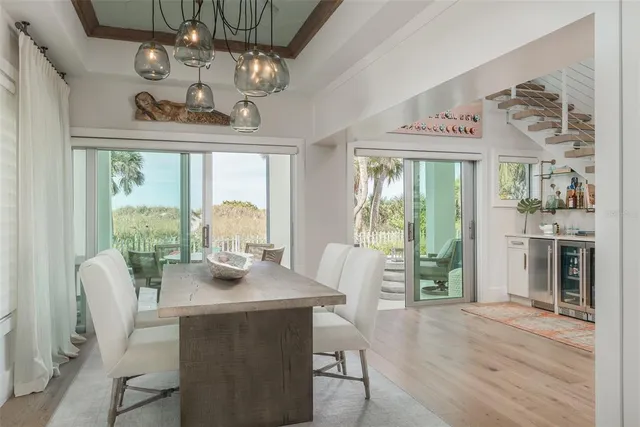 a bathroom with a sink mirror and vanity