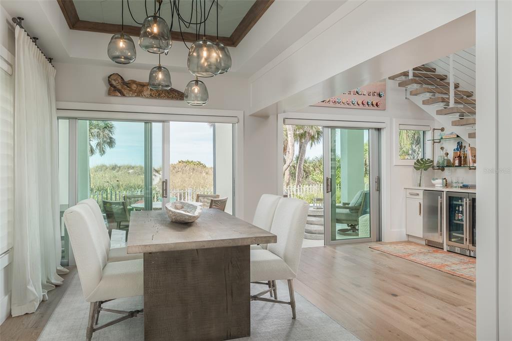 2807 Sunset Way St. Pete Beach, FL 33706 - Photo 16 of 49 a view of a dining room with furniture window and outside view
